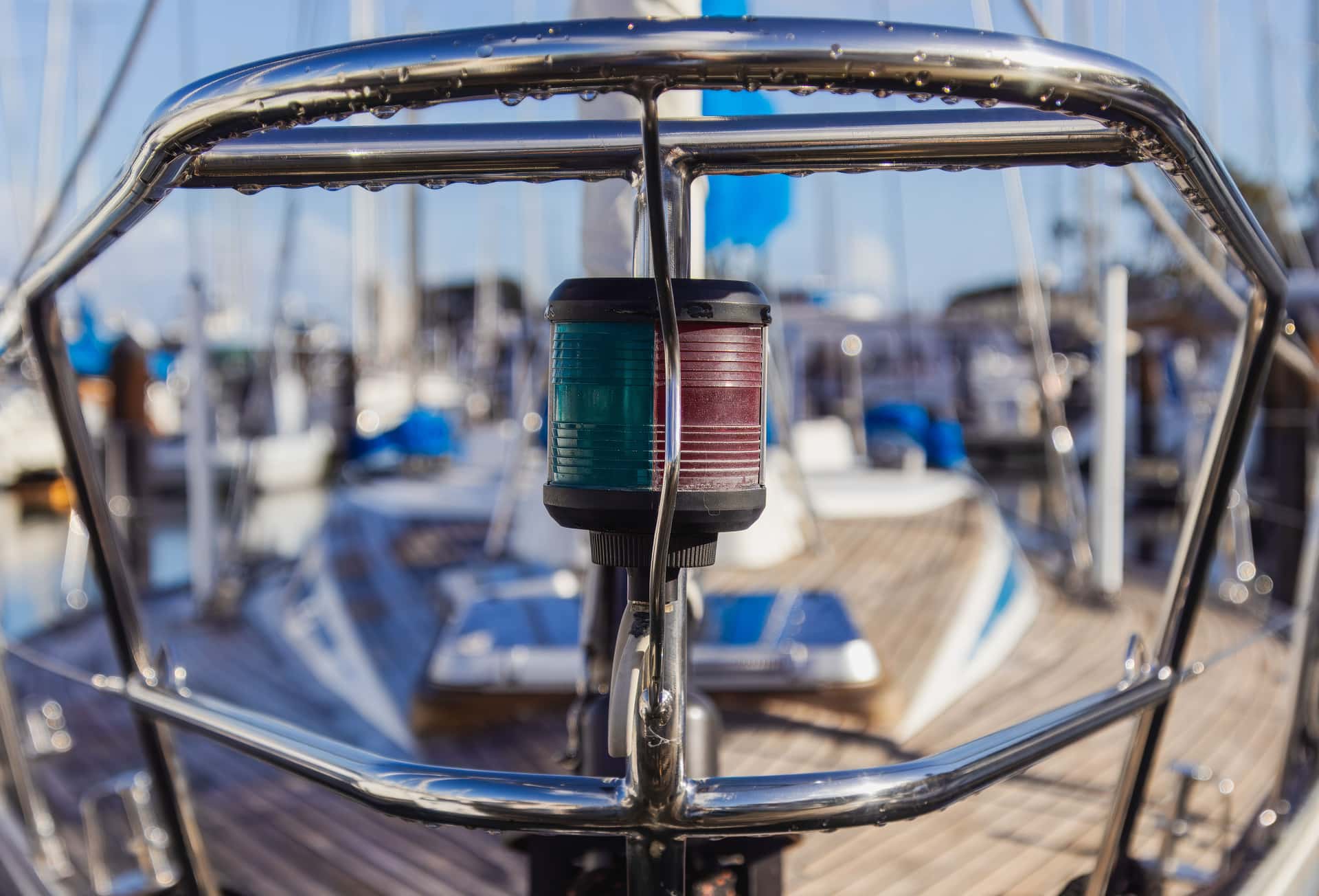 Metal railings and navigation lights on a yacht